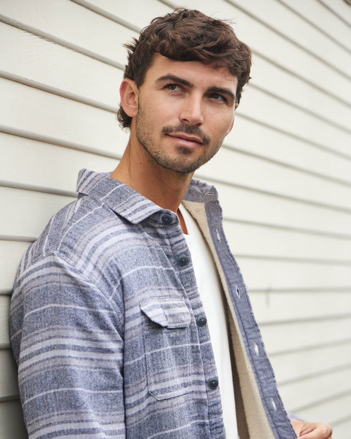 Men's grey stripe sherpa jacket from Toes on the Nose, worn in a lifestyle setting outdoors. #color_grey stripe