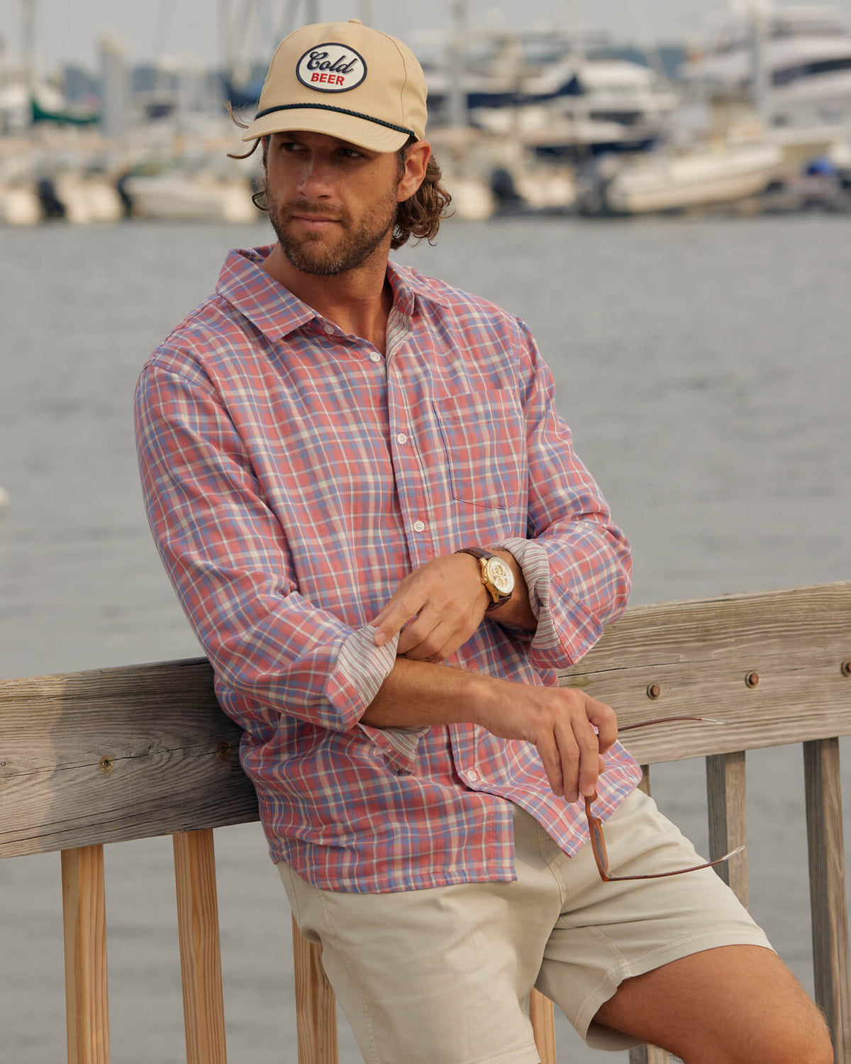 Men's faded rose from Toes on the Nose, worn in a lifestyle setting outdoors.
#color_faded rose