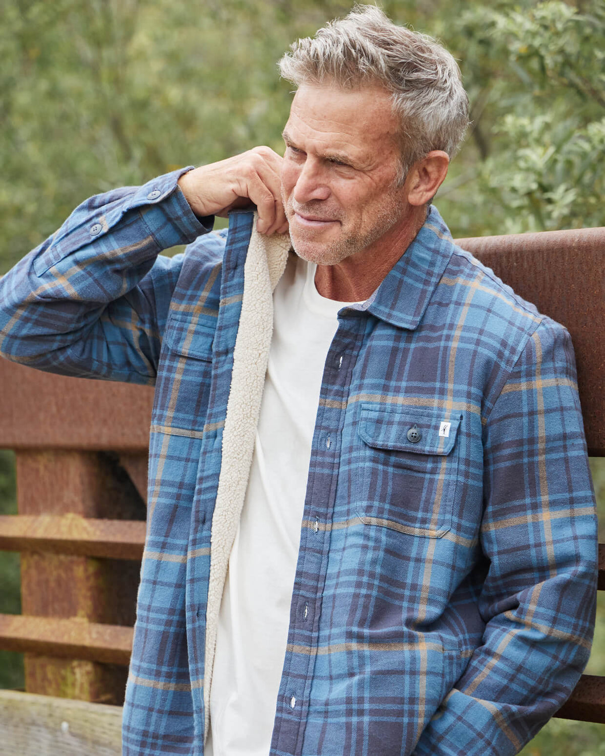 Men's smoke plaid sherpa jacket from Toes on the Nose, worn in a lifestyle setting outdoors. #color_smoke plaid