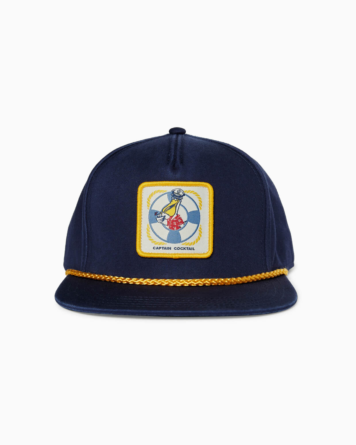 Navy blue baseball cap featuring a yellow braided rope accent and a patch of a pelican wearing a captain's hat holding a cocktail.