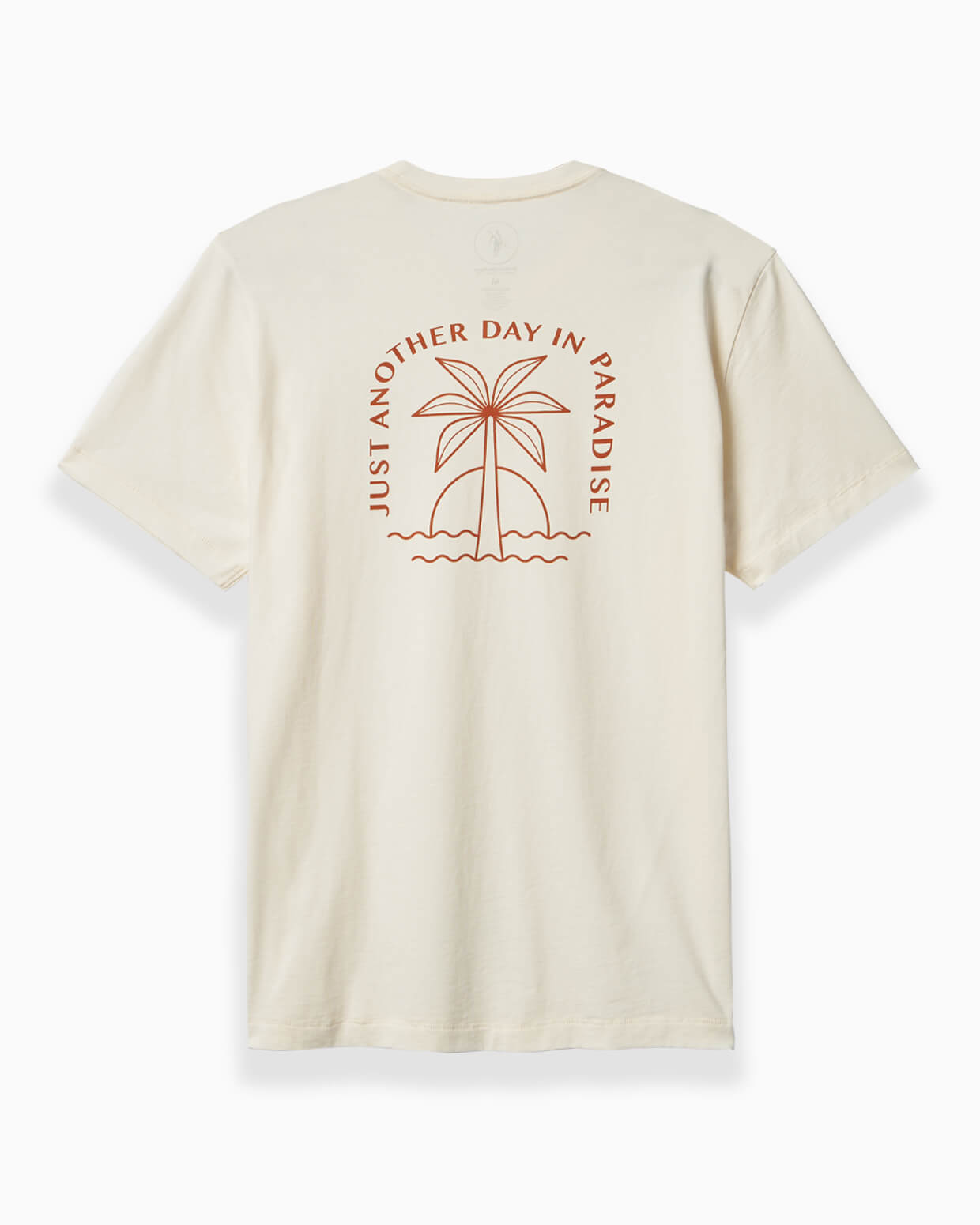 Men's off-white t-shirt with paradise palm tree illustration and "Just Another Day in Paradise" text, displayed flat on a clean background.