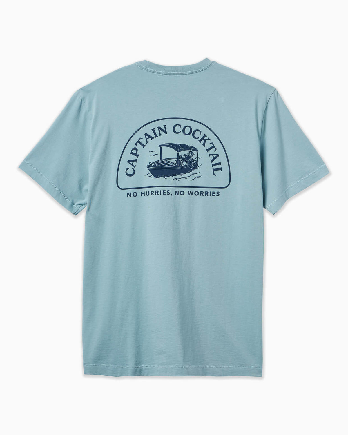 Men's light blue t-shirt with Captain Cocktail boat graphic and "No Hurries, No Worries" text, displayed flat on a clean background.