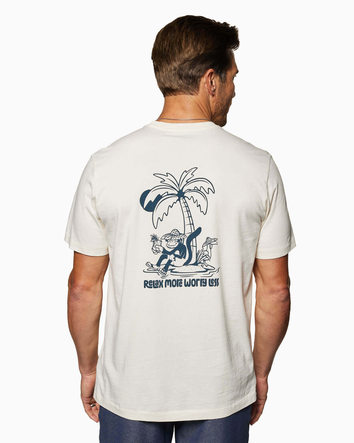 White Toes on the Nose Relax Short Sleeve T-shirt with a back graphic of a laid-back character lounging in a hammock between palm trees, holding a drink, with the text “Relax More Worry Less.”