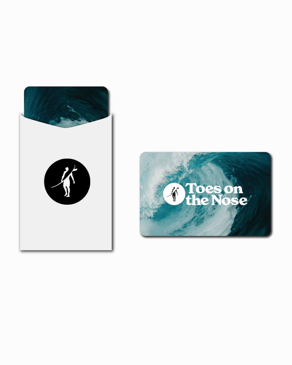 "Toes on the Nose" gift card featuring a surfer riding a wave and the company logo.