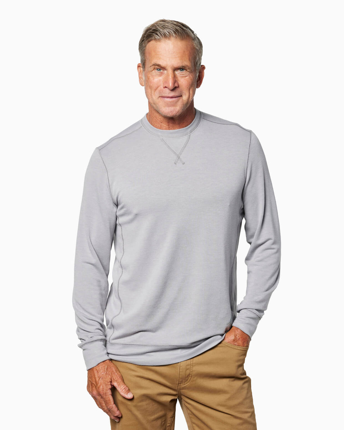 Man wearing grey crewneck against white background #color_light grey