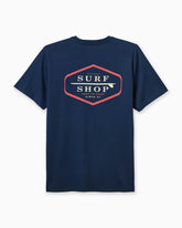 Mne's navy t-shirt with surf shop design displayed on a white background