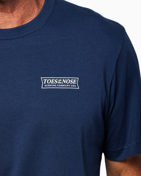 Navy blue t-shirt with Toes on the Nose logo on the chest against a white background