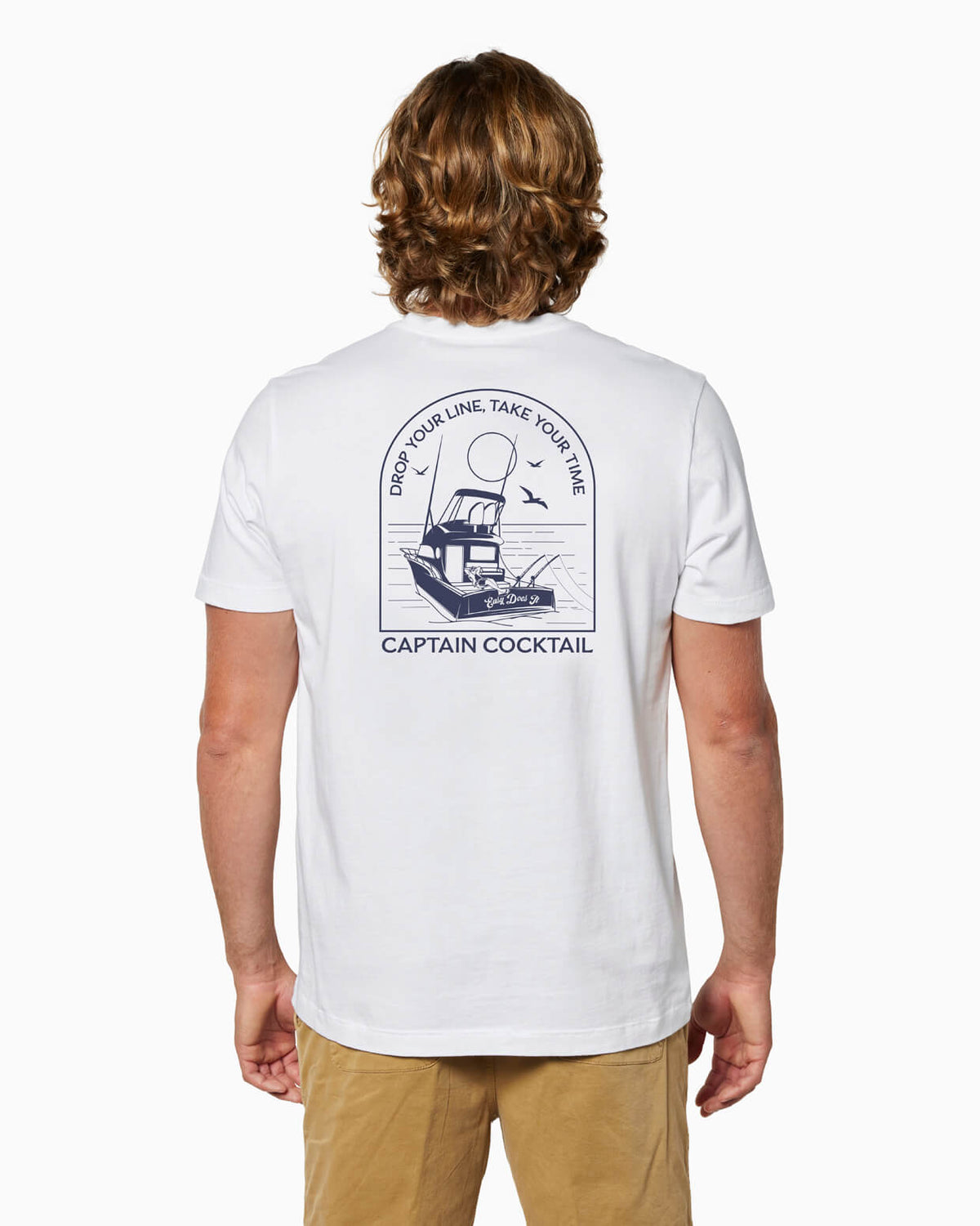 Man wearing white t-shirt with 'Captain Cocktail' graphic  Drop You're Line design on the back. #color_white